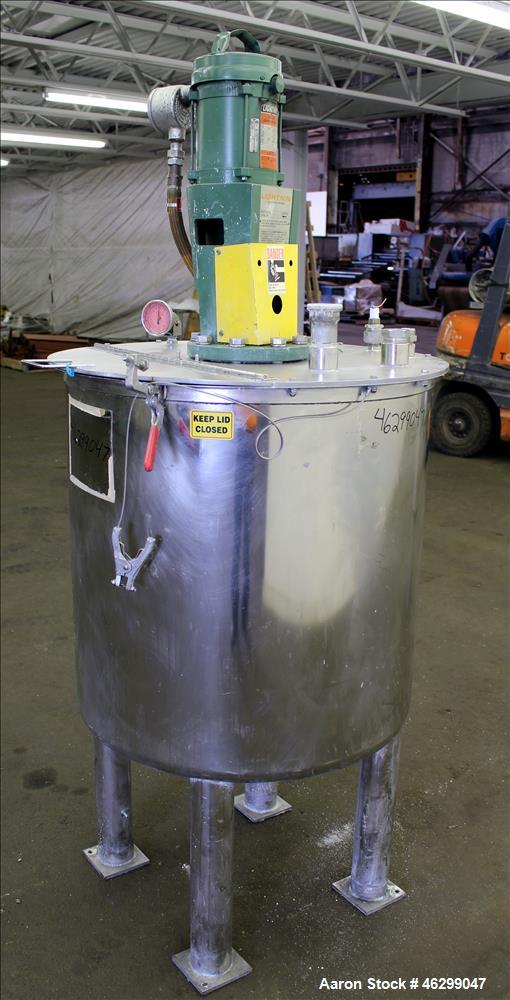 Used Tank, Approximately 80 Gallons, 304 Stainless Steel, Vertical. 30" Diameter x 28" straight side. Bolt on flat top with 1/3 hinged cover, dished bottom. Top entering Lightnin agitator model XJC-3...