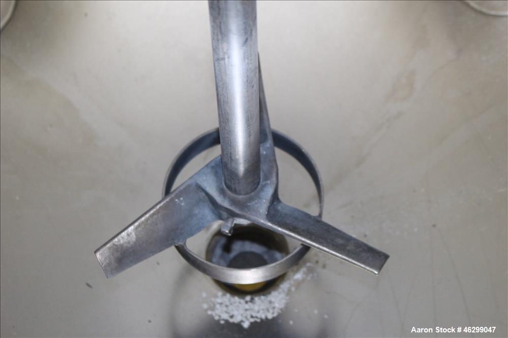 Used Tank, Approximately 80 Gallons, 304 Stainless Steel, Vertical. 30" Diameter x 28" straight side. Bolt on flat top with 1/3 hinged cover, dished bottom. Top entering Lightnin agitator model XJC-3...