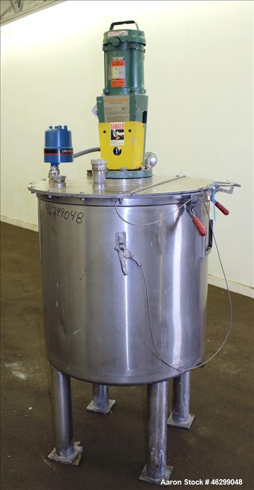 Used Tank, Approximately 80 Gallons, 304 Stainless Steel, Vertical. 30" Diameter x 28" straight side. Bolt-on flat top with 1/3 hinged cover, dished bottom. Top entering Lightnin agitator model XJC-3...
