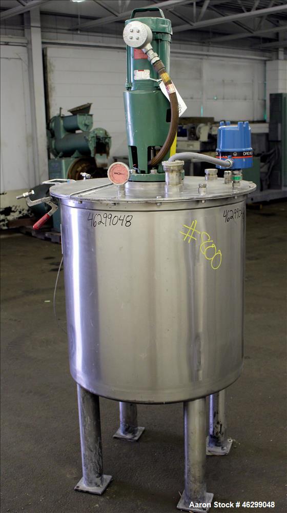 Used Tank, Approximately 80 Gallons, 304 Stainless Steel, Vertical. 30" Diameter x 28" straight side. Bolt-on flat top with 1/3 hinged cover, dished bottom. Top entering Lightnin agitator model XJC-3...