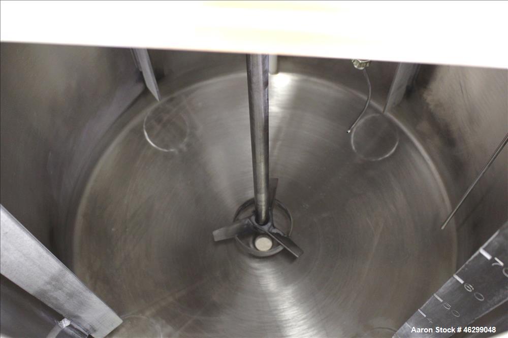 Used Tank, Approximately 80 Gallons, 304 Stainless Steel, Vertical. 30" Diameter x 28" straight side. Bolt-on flat top with 1/3 hinged cover, dished bottom. Top entering Lightnin agitator model XJC-3...