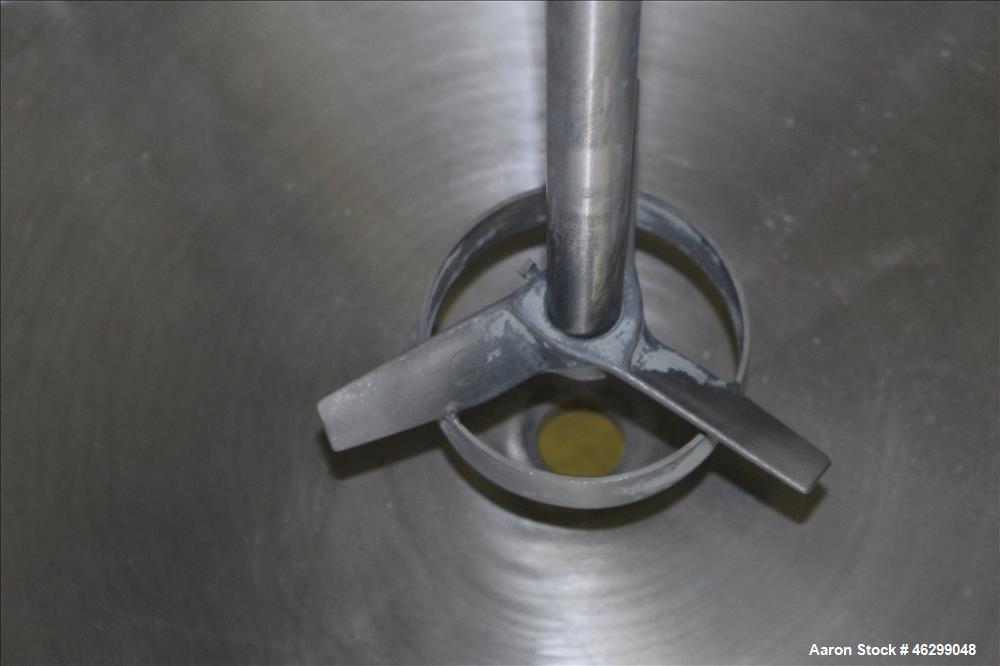 Used Tank, Approximately 80 Gallons, 304 Stainless Steel, Vertical. 30" Diameter x 28" straight side. Bolt-on flat top with 1/3 hinged cover, dished bottom. Top entering Lightnin agitator model XJC-3...