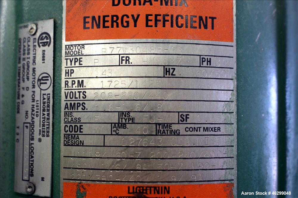 Used Tank, Approximately 80 Gallons, 304 Stainless Steel, Vertical. 30" Diameter x 28" straight side. Bolt-on flat top with 1/3 hinged cover, dished bottom. Top entering Lightnin agitator model XJC-3...