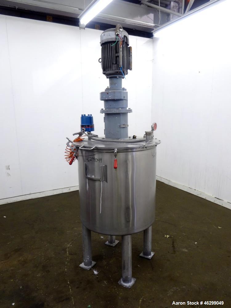Used Tank, Approximately 80 Gallons, 304 Stainless Steel, Vertical. 30" Diameter x 28" straight side. Bolt-on flat top with 1/3 hinged cover, dished bottom. Top entering agitator, with 2" diameter sh...