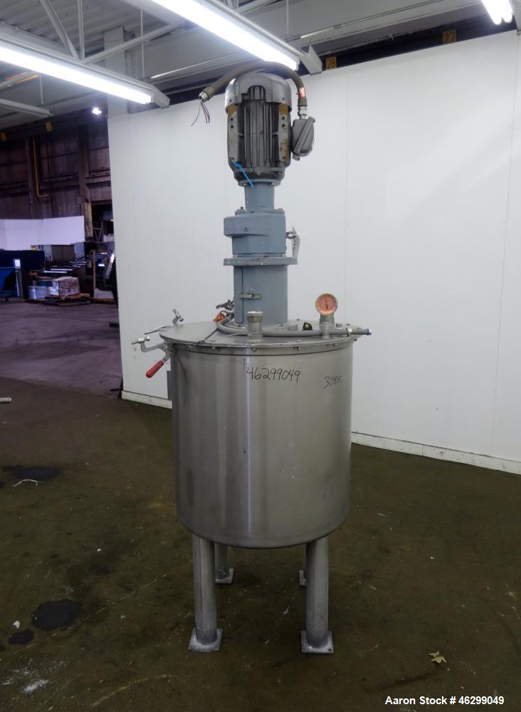 Used Tank, Approximately 80 Gallons, 304 Stainless Steel, Vertical. 30" Diameter x 28" straight side. Bolt-on flat top with 1/3 hinged cover, dished bottom. Top entering agitator, with 2" diameter sh...