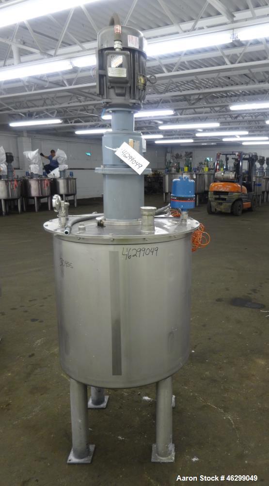 Used Tank, Approximately 80 Gallons, 304 Stainless Steel, Vertical. 30" Diameter x 28" straight side. Bolt-on flat top with 1/3 hinged cover, dished bottom. Top entering agitator, with 2" diameter sh...