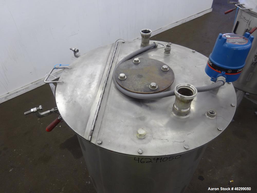 Used Tank, Approximately 80 Gallons, 304 Stainless Steel, Vertical. 30" Diameter x 28" straight side. Bolt-on flat top with 1/3 hinged cover, dished bottom. (4) Sidewall baffles. 1-1/2" Tri-clamp cen...