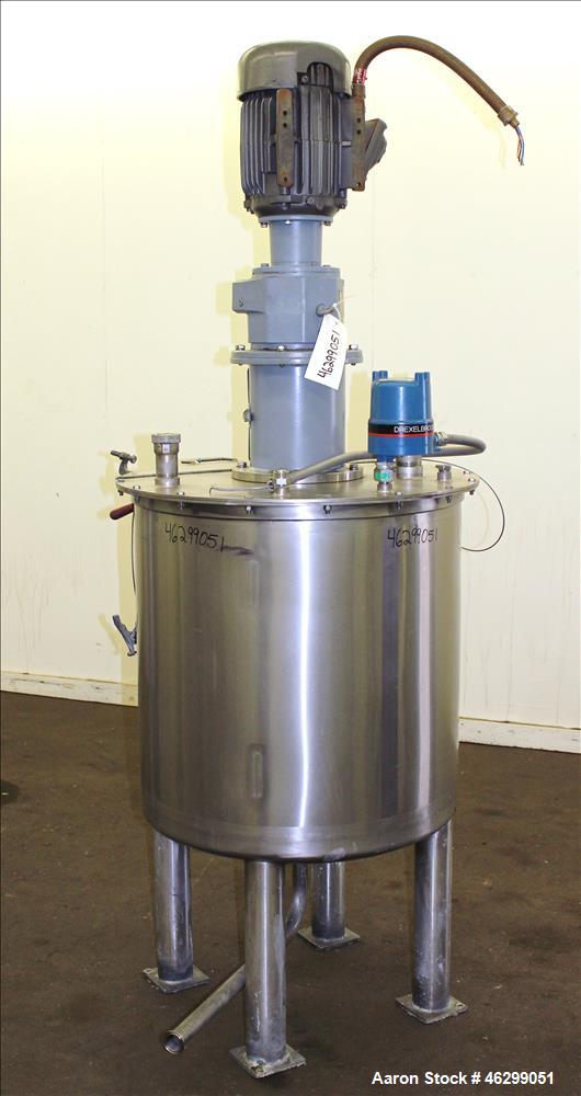 Used Tank, Approximately 80 Gallons, 304 Stainless Steel, Vertical. 30" Diameter x 28" straight side. Bolt-on flat top with 1/3 hinged cover, dished bottom. Top entering agitator, with 2" diameter sh...