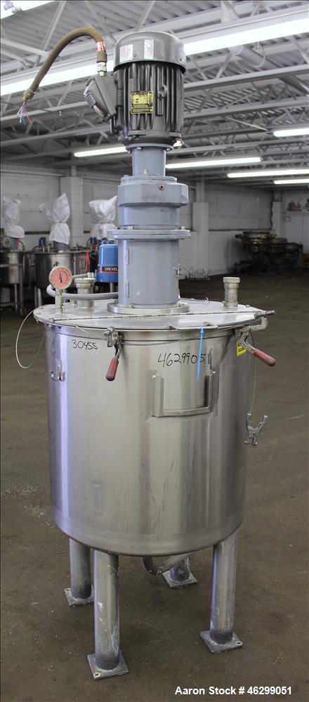 Used Tank, Approximately 80 Gallons, 304 Stainless Steel, Vertical. 30" Diameter x 28" straight side. Bolt-on flat top with 1/3 hinged cover, dished bottom. Top entering agitator, with 2" diameter sh...
