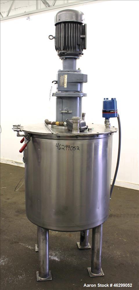 Used Tank, Approximately 80 Gallons, 304 Stainless Steel, Vertical. 30" Diameter x 28" straight side. Bolt-on flat top with 1/3 hinged cover, dished bottom. Top entering agitator, with 2" diameter sh...