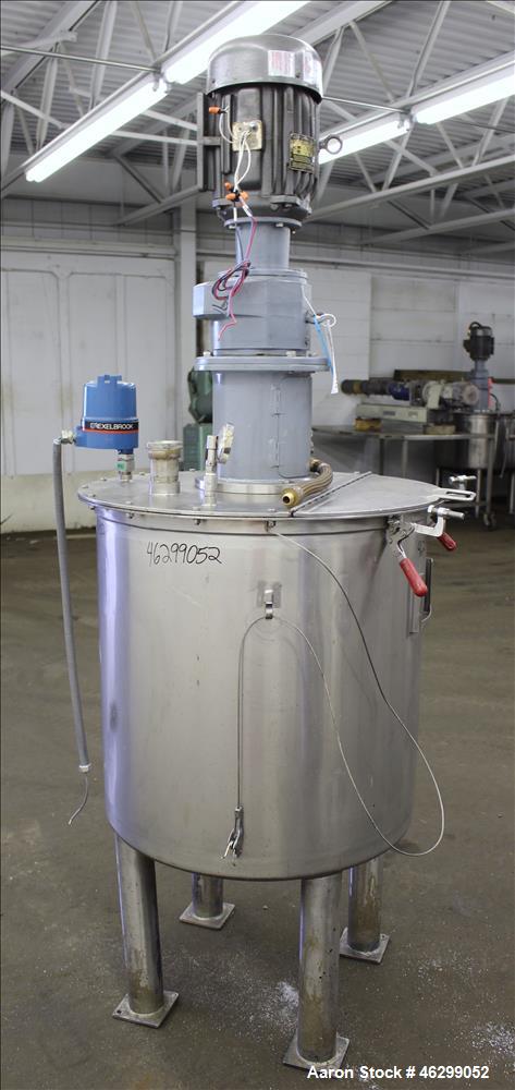 Used Tank, Approximately 80 Gallons, 304 Stainless Steel, Vertical. 30" Diameter x 28" straight side. Bolt-on flat top with 1/3 hinged cover, dished bottom. Top entering agitator, with 2" diameter sh...
