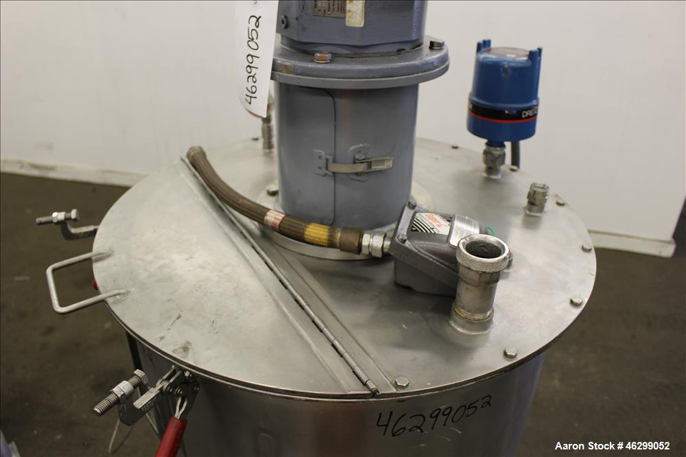 Used Tank, Approximately 80 Gallons, 304 Stainless Steel, Vertical. 30" Diameter x 28" straight side. Bolt-on flat top with 1/3 hinged cover, dished bottom. Top entering agitator, with 2" diameter sh...