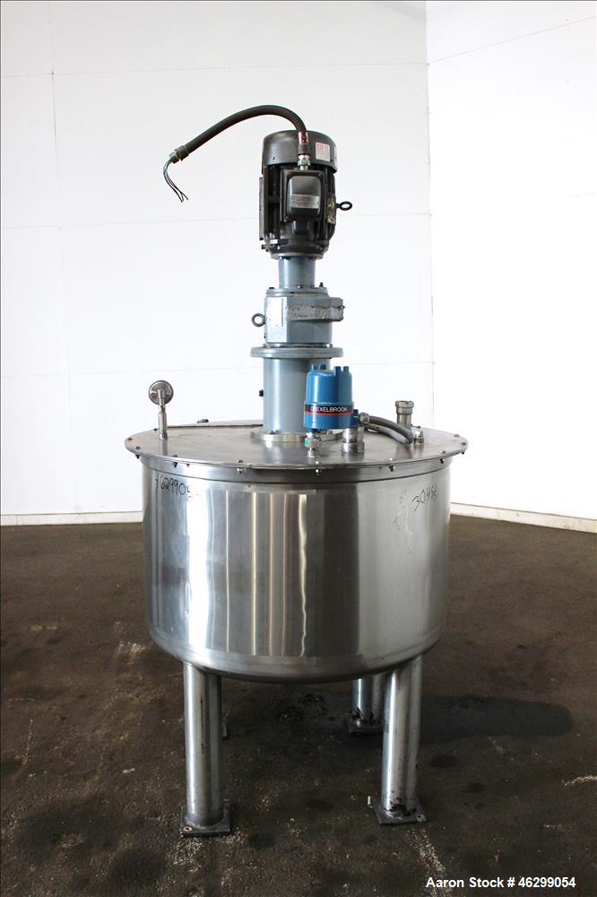 Used Tank, Approximately 120 Gallons, 304 Stainless Steel, Vertical. 40" Diameter x 22" straight side. Bolt-on flat top with 1/4 hinged cover, dished bottom. Top entering agitator, with 2" diameter s...