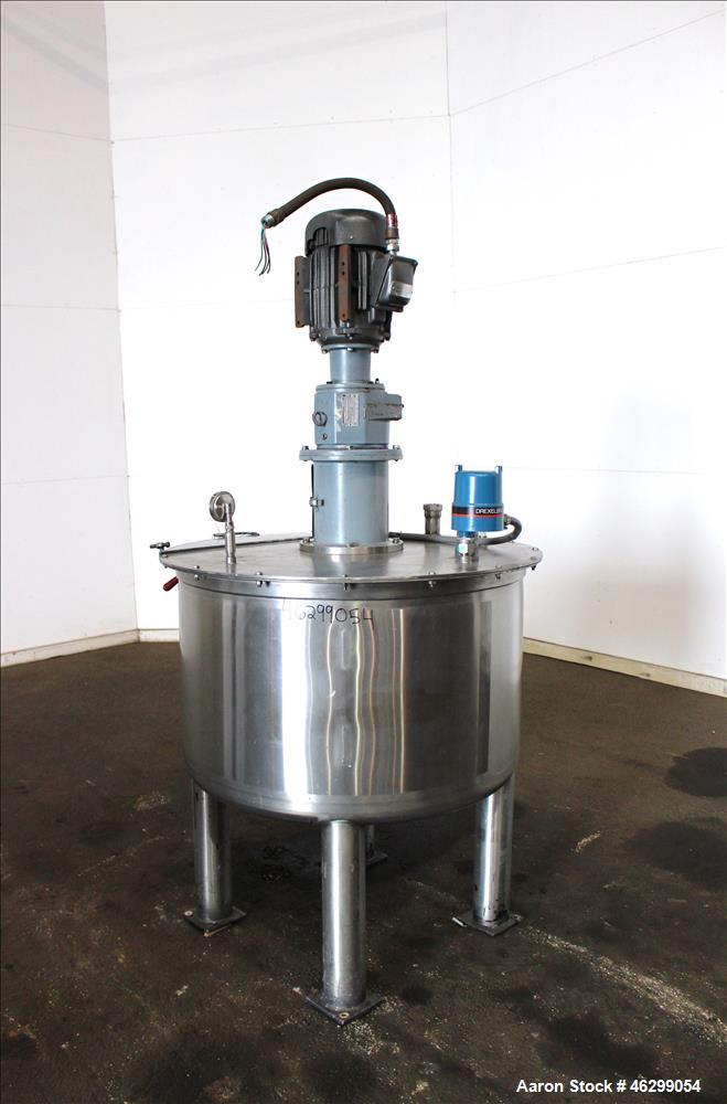 Used Tank, Approximately 120 Gallons, 304 Stainless Steel, Vertical. 40" Diameter x 22" straight side. Bolt-on flat top with 1/4 hinged cover, dished bottom. Top entering agitator, with 2" diameter s...
