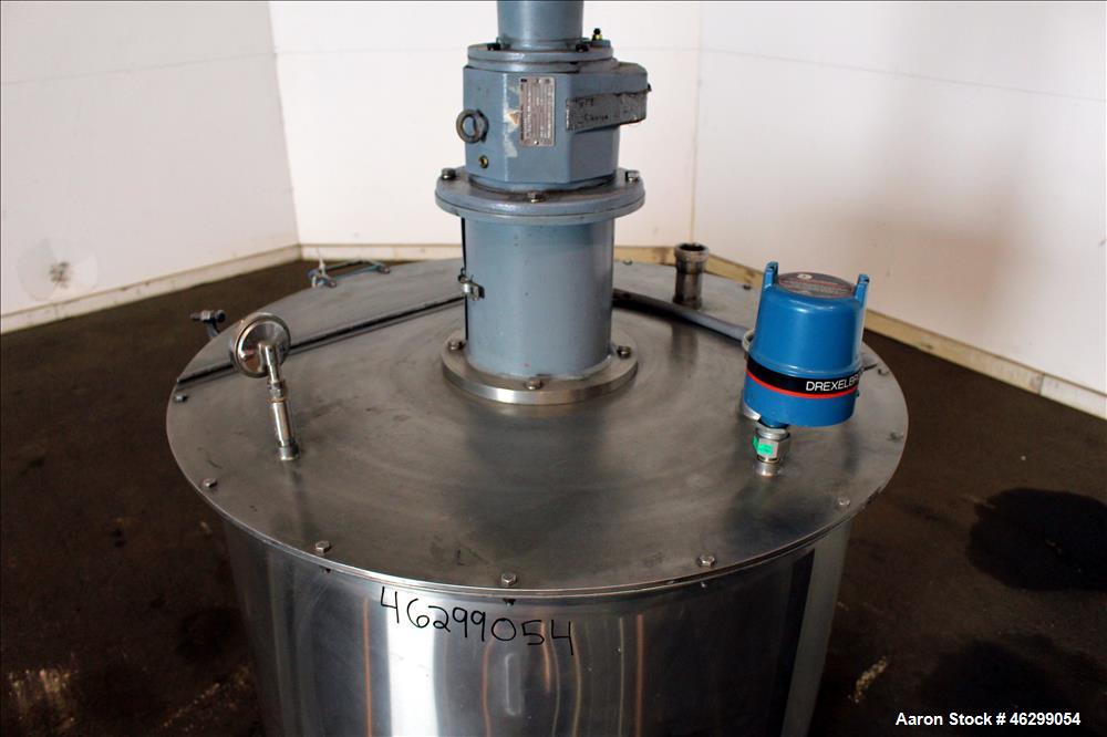Used Tank, Approximately 120 Gallons, 304 Stainless Steel, Vertical. 40" Diameter x 22" straight side. Bolt-on flat top with 1/4 hinged cover, dished bottom. Top entering agitator, with 2" diameter s...