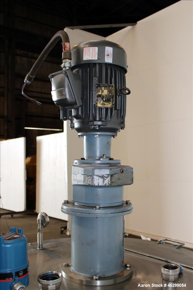 Used Tank, Approximately 120 Gallons, 304 Stainless Steel, Vertical. 40" Diameter x 22" straight side. Bolt-on flat top with 1/4 hinged cover, dished bottom. Top entering agitator, with 2" diameter s...