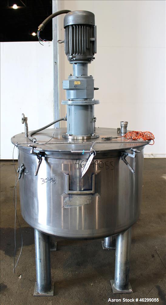 Used Tank, Approximately 120 Gallons, 304 Stainless Steel, Vertical. 40" Diameter x 22" straight side. Bolt-on flat top with 1/4 hinged cover, dished bottom. Top entering agitator, with 2" diameter s...