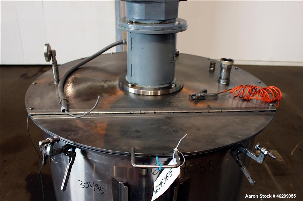 Used Tank, Approximately 120 Gallons, 304 Stainless Steel, Vertical. 40" Diameter x 22" straight side. Bolt-on flat top with 1/4 hinged cover, dished bottom. Top entering agitator, with 2" diameter s...