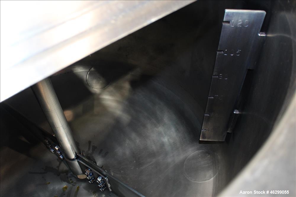 Used Tank, Approximately 120 Gallons, 304 Stainless Steel, Vertical. 40" Diameter x 22" straight side. Bolt-on flat top with 1/4 hinged cover, dished bottom. Top entering agitator, with 2" diameter s...