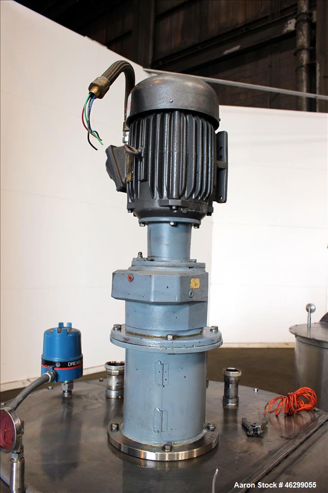 Used Tank, Approximately 120 Gallons, 304 Stainless Steel, Vertical. 40" Diameter x 22" straight side. Bolt-on flat top with 1/4 hinged cover, dished bottom. Top entering agitator, with 2" diameter s...