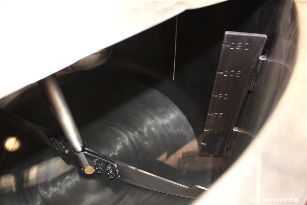 Used Tank, Approximately 120 Gallons, 304 Stainless Steel, Vertical. 40" Diameter x 22" straight side. Bolt-on flat top with 1/4 hinged cover, dished bottom. Top entering agitator, with 2" diameter s...