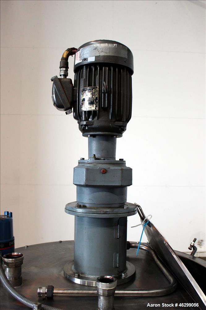 Used Tank, Approximately 120 Gallons, 304 Stainless Steel, Vertical. 40" Diameter x 22" straight side. Bolt-on flat top with 1/4 hinged cover, dished bottom. Top entering agitator, with 2" diameter s...