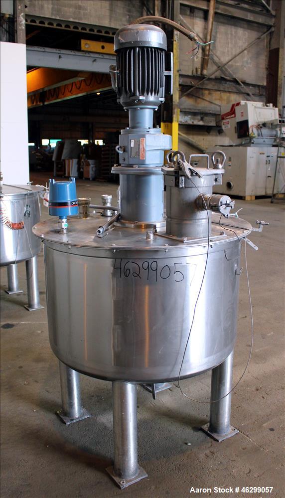 Used Tank, Approximately 120 Gallons, 304 Stainless Steel, Vertical. 40" Diameter x 22" straight side. Bolt-on flat top with 1/4 hinged cover, dished bottom. Top entering agitator, with 2" diameter s...