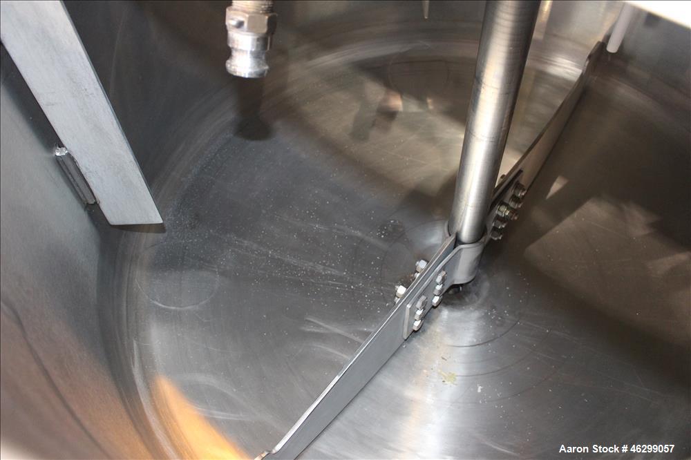 Used Tank, Approximately 120 Gallons, 304 Stainless Steel, Vertical. 40" Diameter x 22" straight side. Bolt-on flat top with 1/4 hinged cover, dished bottom. Top entering agitator, with 2" diameter s...