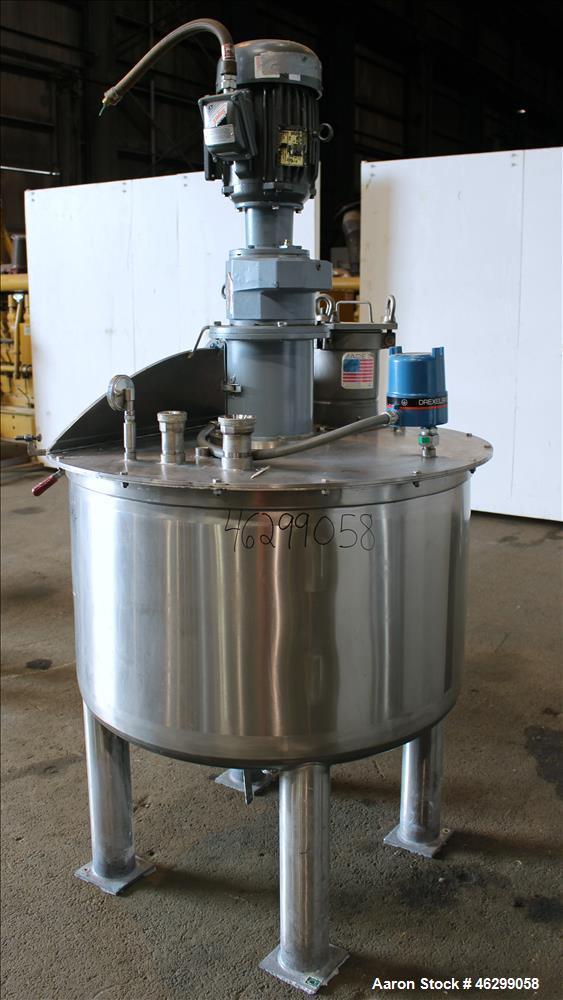 Used Tank, Approximately 120 Gallons, 304 Stainless Steel, Vertical. 40" Diameter x 22" straight side. Bolt-on flat top with 1/4 hinged cover, dished bottom. Top entering agitator, with 2" diameter s...