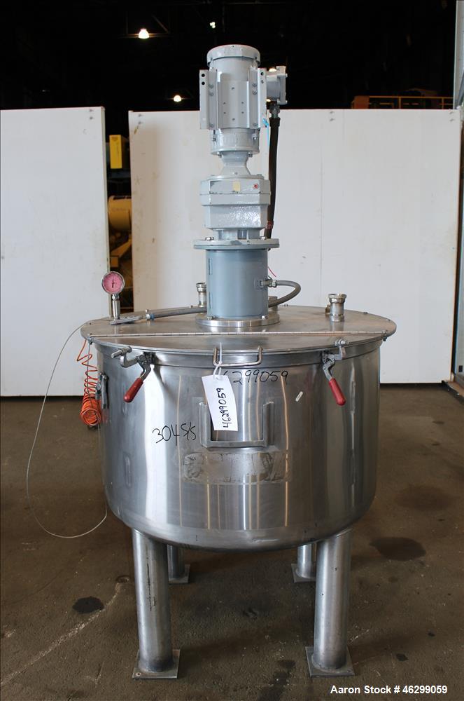 Used Tank, Approximately 120 Gallons, 304 Stainless Steel, Vertical. 40" Diameter x 22" straight side. Bolt-on flat top with 1/4 hinged cover, dished bottom. Top entering agitator, with 2" diameter s...