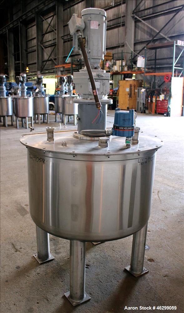 Used Tank, Approximately 120 Gallons, 304 Stainless Steel, Vertical. 40" Diameter x 22" straight side. Bolt-on flat top with 1/4 hinged cover, dished bottom. Top entering agitator, with 2" diameter s...