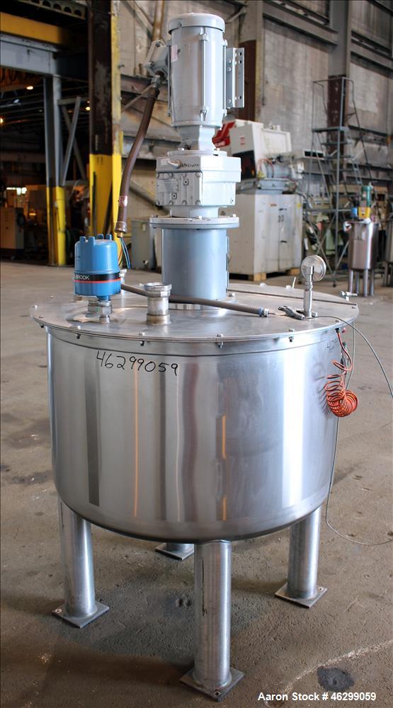 Used Tank, Approximately 120 Gallons, 304 Stainless Steel, Vertical. 40" Diameter x 22" straight side. Bolt-on flat top with 1/4 hinged cover, dished bottom. Top entering agitator, with 2" diameter s...