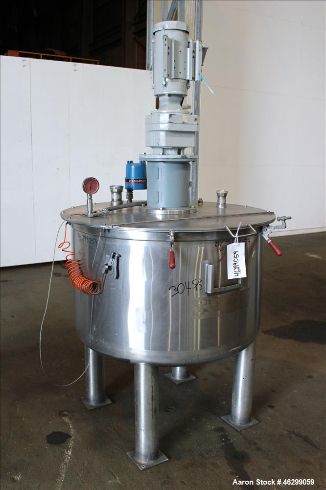 Used Tank, Approximately 120 Gallons, 304 Stainless Steel, Vertical. 40" Diameter x 22" straight side. Bolt-on flat top with 1/4 hinged cover, dished bottom. Top entering agitator, with 2" diameter s...