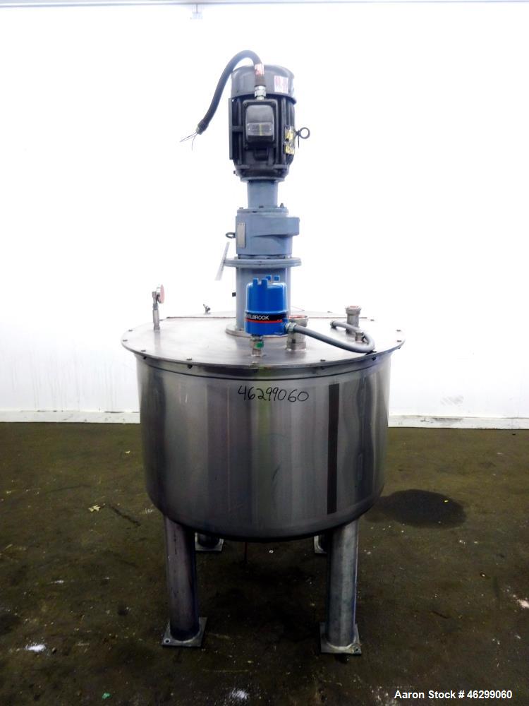 Used Tank, Approximately 120 Gallons, 304 Stainless Steel, Vertical. 40" Diameter x 22" straight side. Bolt-on flat top with 1/4 hinged cover, dished bottom. Top entering agitator, with 2" diameter s...