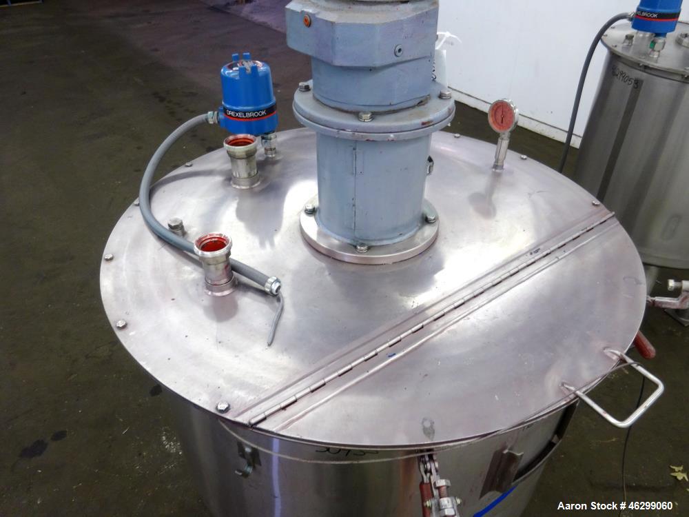 Used Tank, Approximately 120 Gallons, 304 Stainless Steel, Vertical. 40" Diameter x 22" straight side. Bolt-on flat top with 1/4 hinged cover, dished bottom. Top entering agitator, with 2" diameter s...