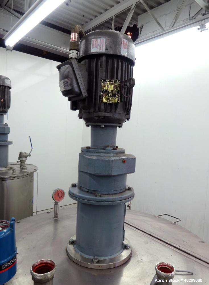 Used Tank, Approximately 120 Gallons, 304 Stainless Steel, Vertical. 40" Diameter x 22" straight side. Bolt-on flat top with 1/4 hinged cover, dished bottom. Top entering agitator, with 2" diameter s...
