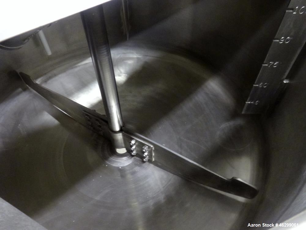 Used Tank, Approximately 120 Gallons, 304 Stainless Steel, Vertical. 40" Diameter x 22" straight side. Bolt-on flat top with 1/4 hinged cover, dished bottom. Top entering agitator, with 2" diameter s...