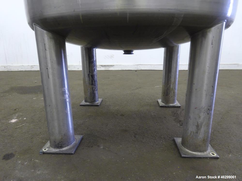 Used Tank, Approximately 120 Gallons, 304 Stainless Steel, Vertical. 40" Diameter x 22" straight side. Bolt-on flat top with 1/4 hinged cover, dished bottom. Top entering agitator, with 2" diameter s...