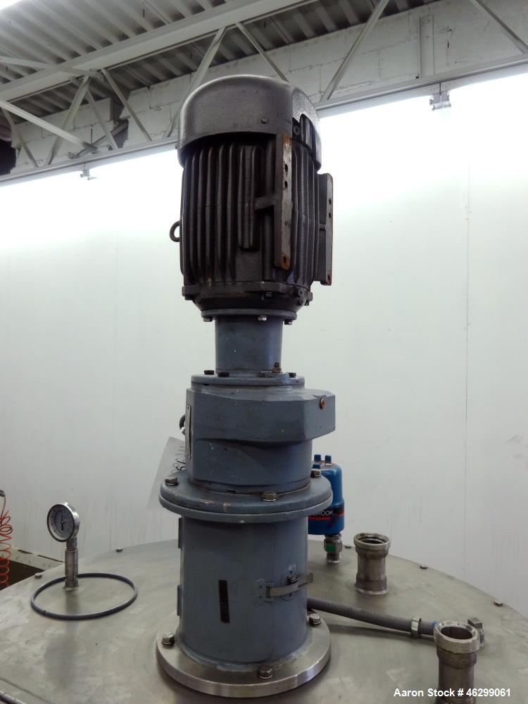 Used Tank, Approximately 120 Gallons, 304 Stainless Steel, Vertical. 40" Diameter x 22" straight side. Bolt-on flat top with 1/4 hinged cover, dished bottom. Top entering agitator, with 2" diameter s...