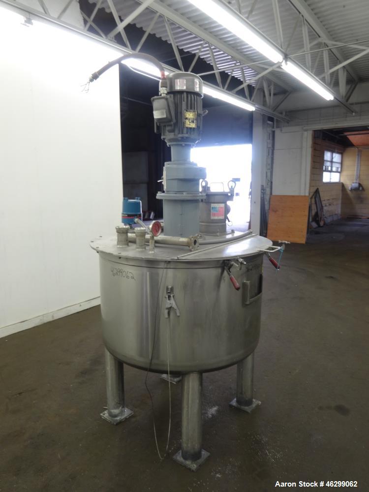 Used Tank, Approximately 120 Gallons, 304 Stainless Steel, Vertical. 40" Diameter x 22" straight side. Bolt-on flat top with 1/4 hinged cover, dished bottom. Top entering agitator, with 2" diameter s...
