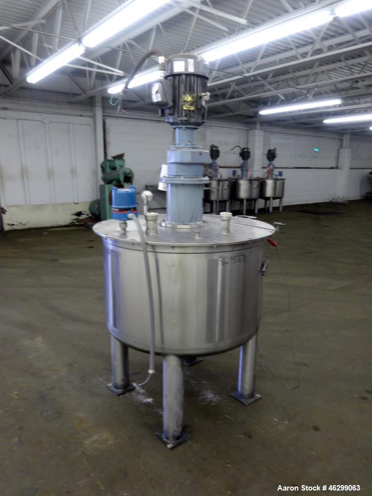 Used Tank, Approximately 120 Gallons, 304 Stainless Steel, Vertical. 40" Diameter x 22" straight side. Bolt-on flat top with 1/4 hinged cover, dished bottom. Top entering agitator, with 2" diameter s...