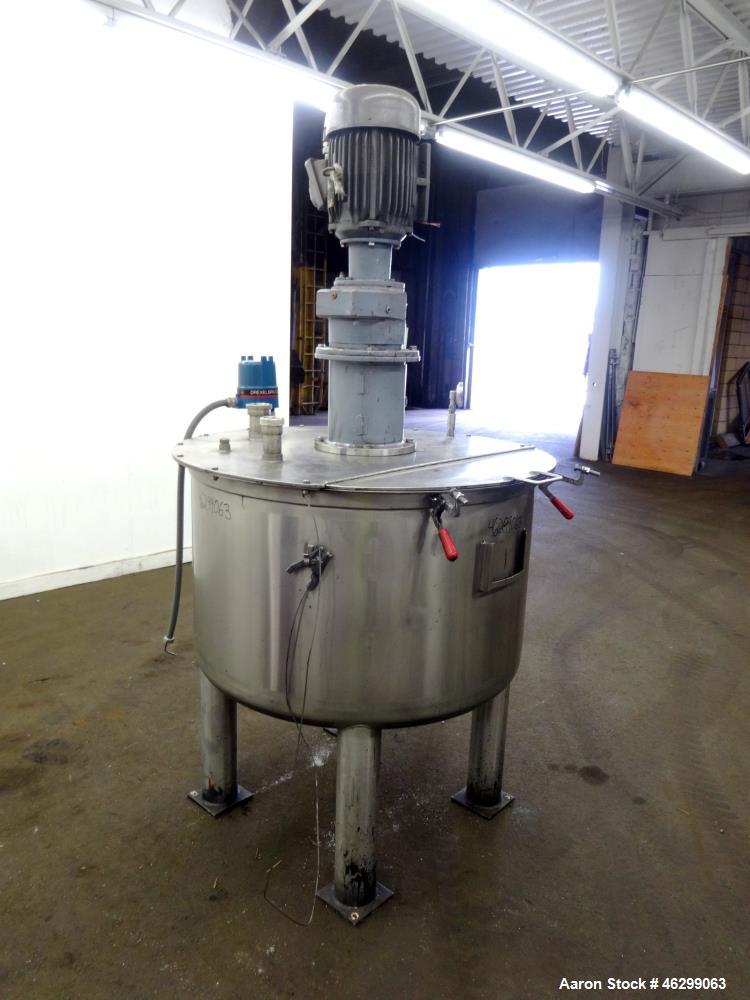 Used Tank, Approximately 120 Gallons, 304 Stainless Steel, Vertical. 40" Diameter x 22" straight side. Bolt-on flat top with 1/4 hinged cover, dished bottom. Top entering agitator, with 2" diameter s...