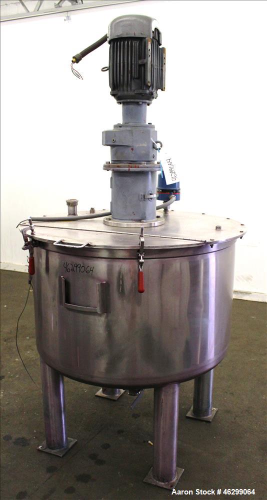 Used Tank, Approximately 120 Gallons, 304 Stainless Steel, Vertical. 40" Diameter x 22" straight side. Bolt-on flat top with 1/4 hinged cover, dished bottom. Top entering agitator, with 2" diameter s...