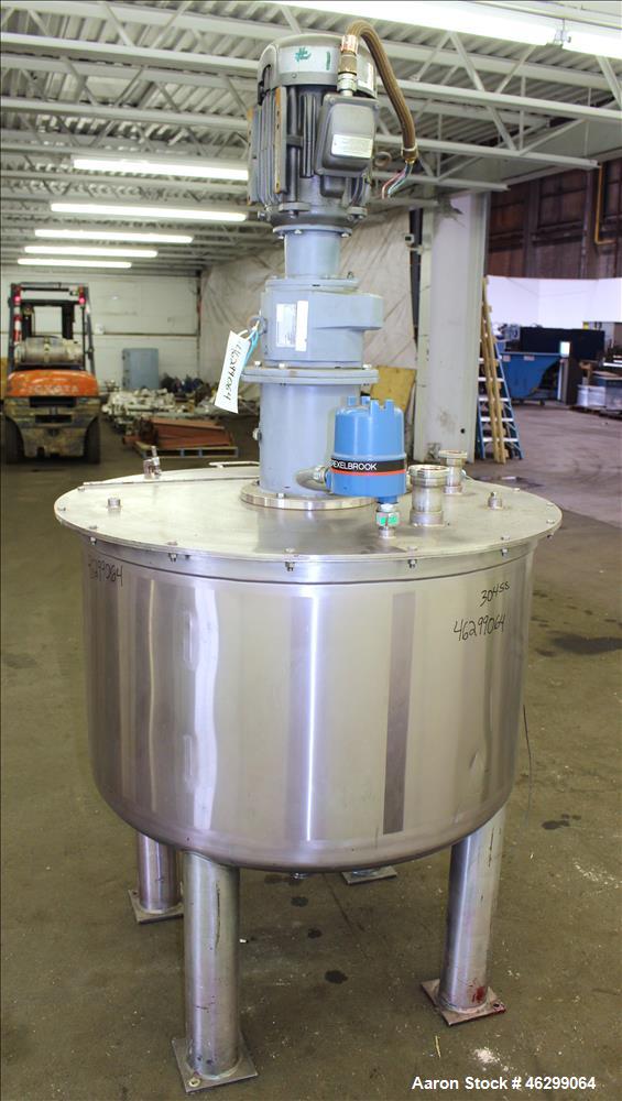 Used Tank, Approximately 120 Gallons, 304 Stainless Steel, Vertical. 40" Diameter x 22" straight side. Bolt-on flat top with 1/4 hinged cover, dished bottom. Top entering agitator, with 2" diameter s...