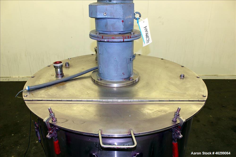 Used Tank, Approximately 120 Gallons, 304 Stainless Steel, Vertical. 40" Diameter x 22" straight side. Bolt-on flat top with 1/4 hinged cover, dished bottom. Top entering agitator, with 2" diameter s...