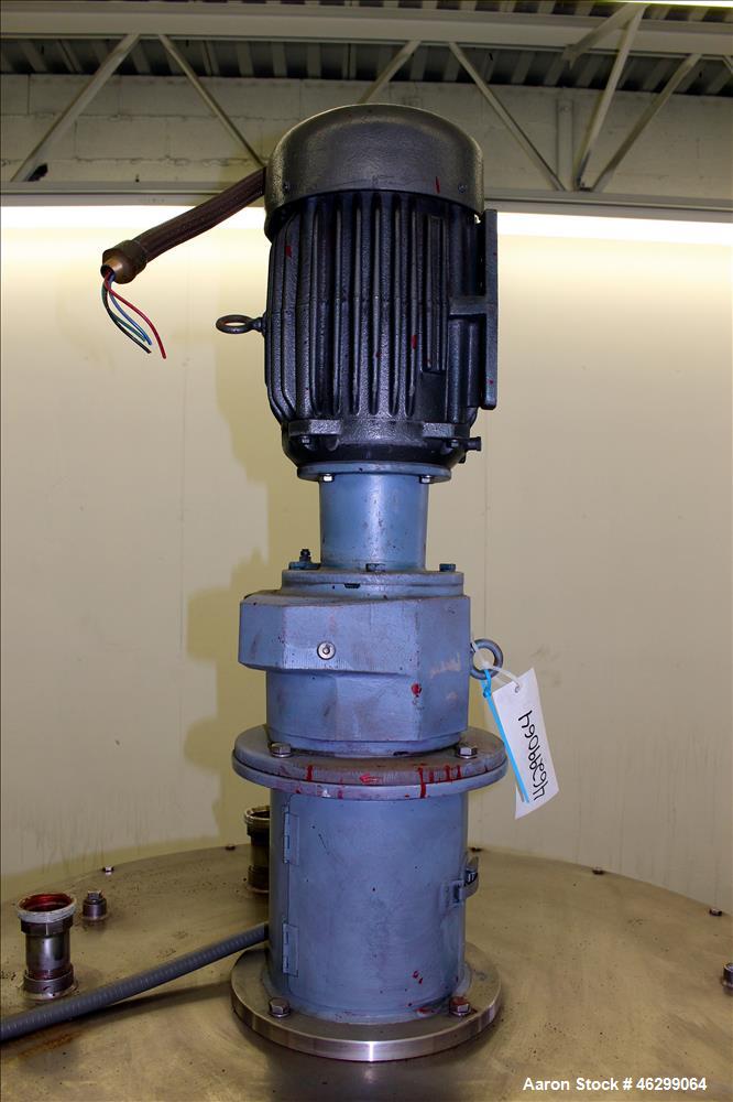 Used Tank, Approximately 120 Gallons, 304 Stainless Steel, Vertical. 40" Diameter x 22" straight side. Bolt-on flat top with 1/4 hinged cover, dished bottom. Top entering agitator, with 2" diameter s...