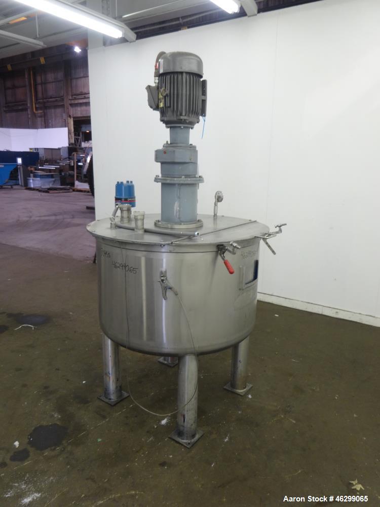 Used Tank, Approximately 120 Gallons, 304 Stainless Steel, Vertical. 40" Diameter x 22" straight side. Bolt-on flat top with 1/4 hinged cover, dished bottom. Top entering agitator, with 2" diameter s...