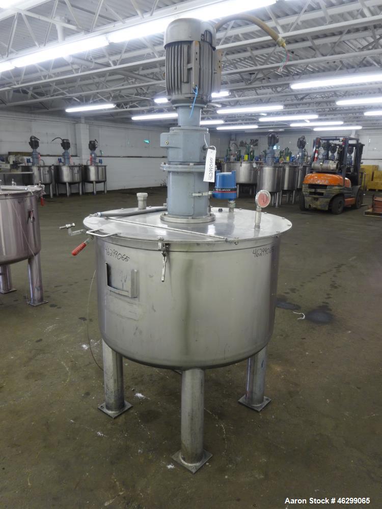 Used Tank, Approximately 120 Gallons, 304 Stainless Steel, Vertical. 40" Diameter x 22" straight side. Bolt-on flat top with 1/4 hinged cover, dished bottom. Top entering agitator, with 2" diameter s...