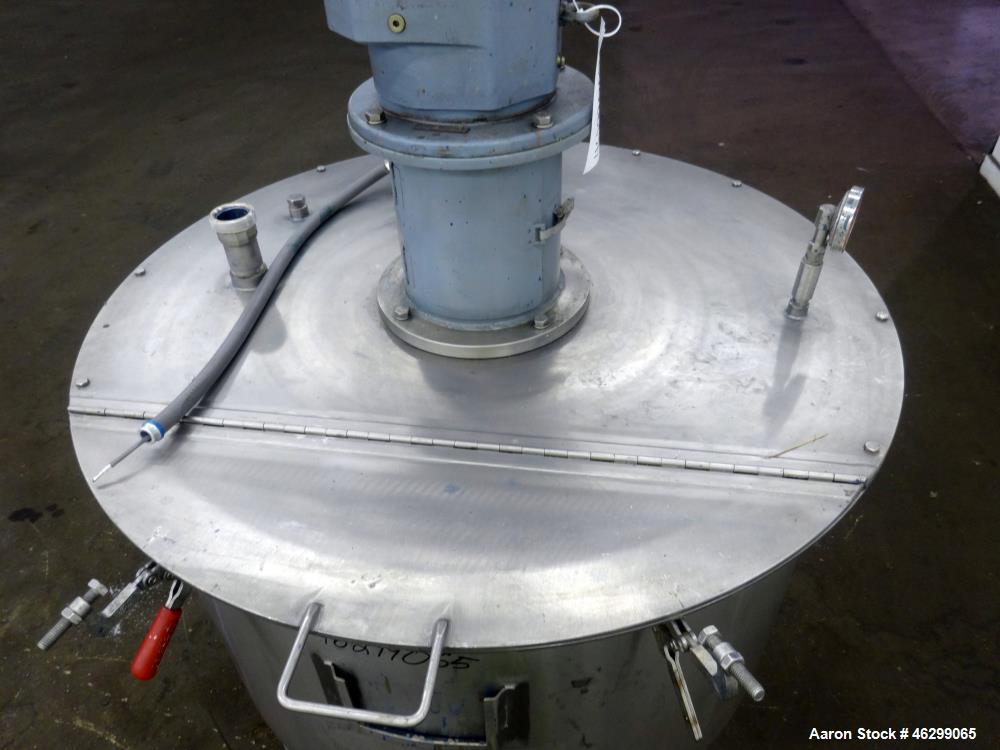 Used Tank, Approximately 120 Gallons, 304 Stainless Steel, Vertical. 40" Diameter x 22" straight side. Bolt-on flat top with 1/4 hinged cover, dished bottom. Top entering agitator, with 2" diameter s...