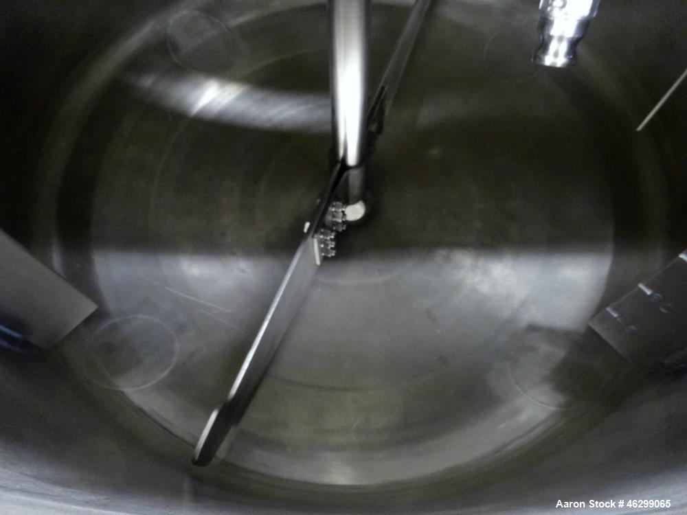 Used Tank, Approximately 120 Gallons, 304 Stainless Steel, Vertical. 40" Diameter x 22" straight side. Bolt-on flat top with 1/4 hinged cover, dished bottom. Top entering agitator, with 2" diameter s...